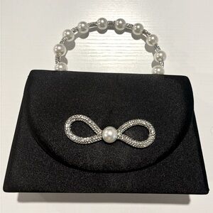 Fashion evening bag with faux pearl detailing